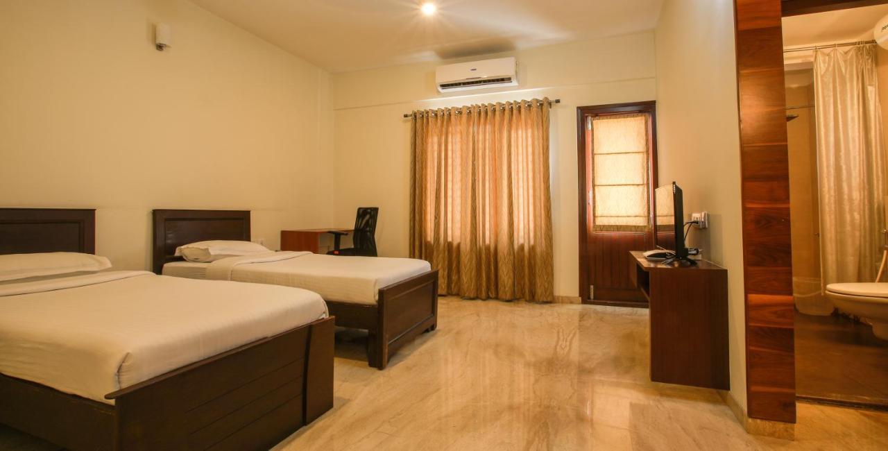 Falcon Suites Yelahanka New Town Бенґалуру Екстер'єр фото